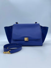 Load image into Gallery viewer, Gently used Celine Blue Medium Trapeze Bag featuring rolled leather top handle and removable long shoulder strap. Bright blue leather and Suede, Gold-tone Hardware