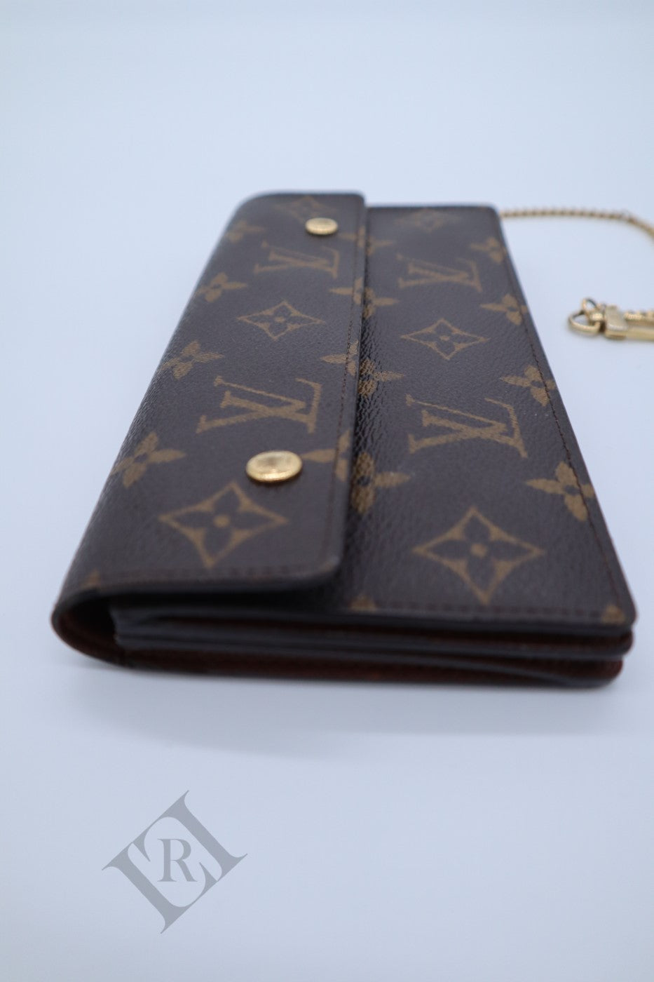 The Louis Vuitton Accodion Moto wallet is classic and edgy at the same